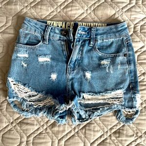 Vintage reunion distressed jean shorts